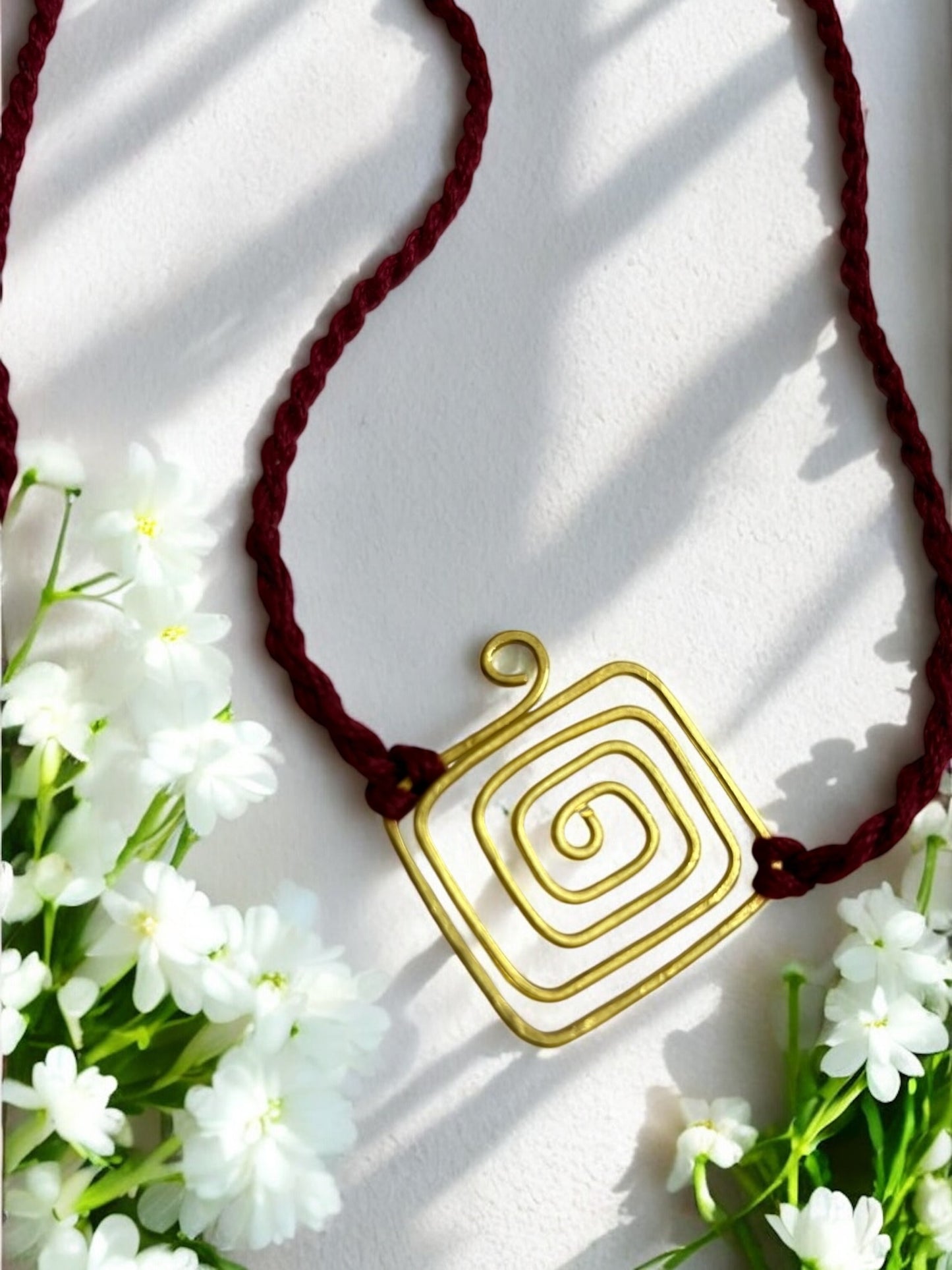 Spiral Kite Forever Brass Rakhi - Maroon