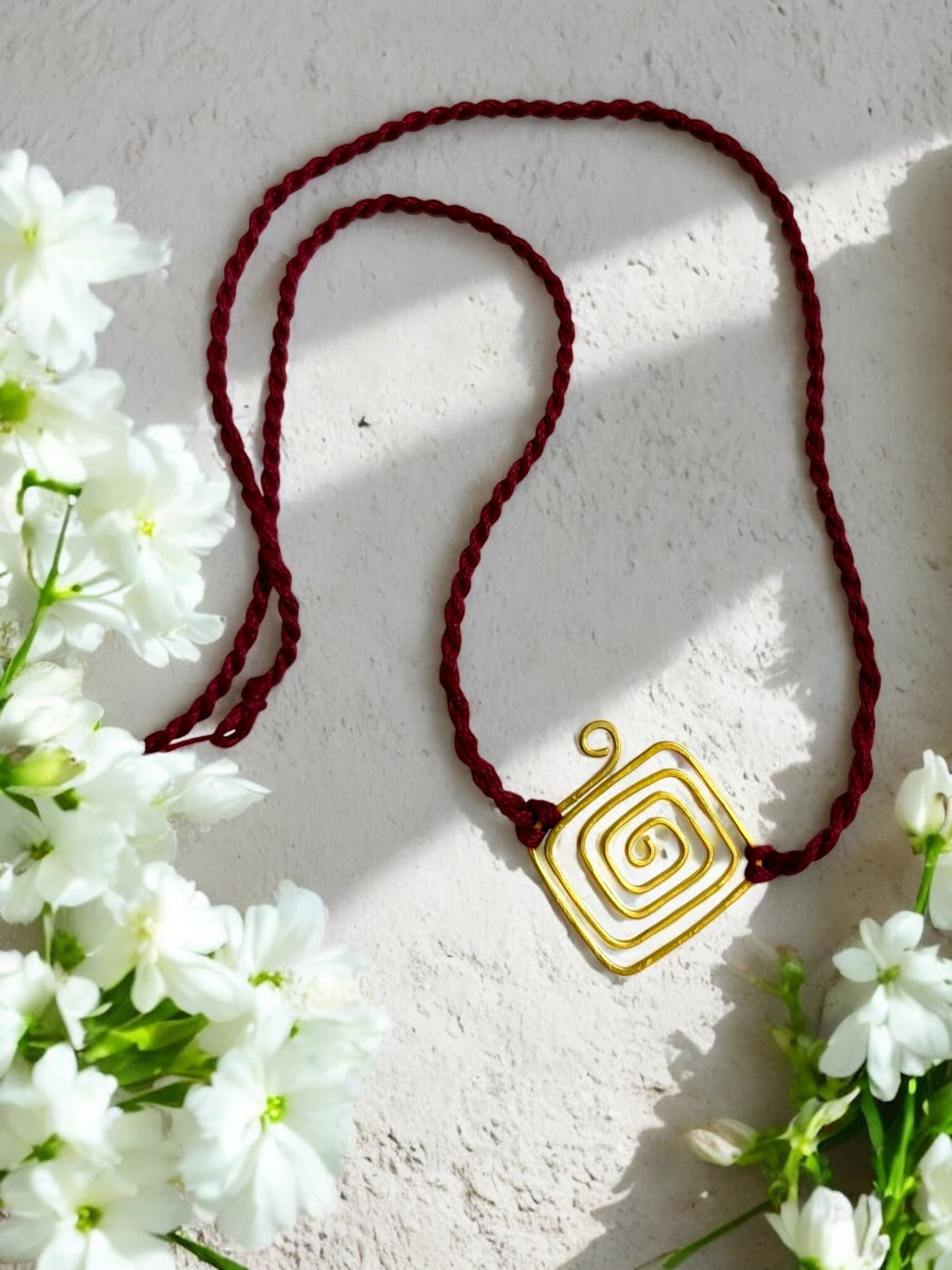 Spiral Kite Forever Brass Rakhi - Maroon
