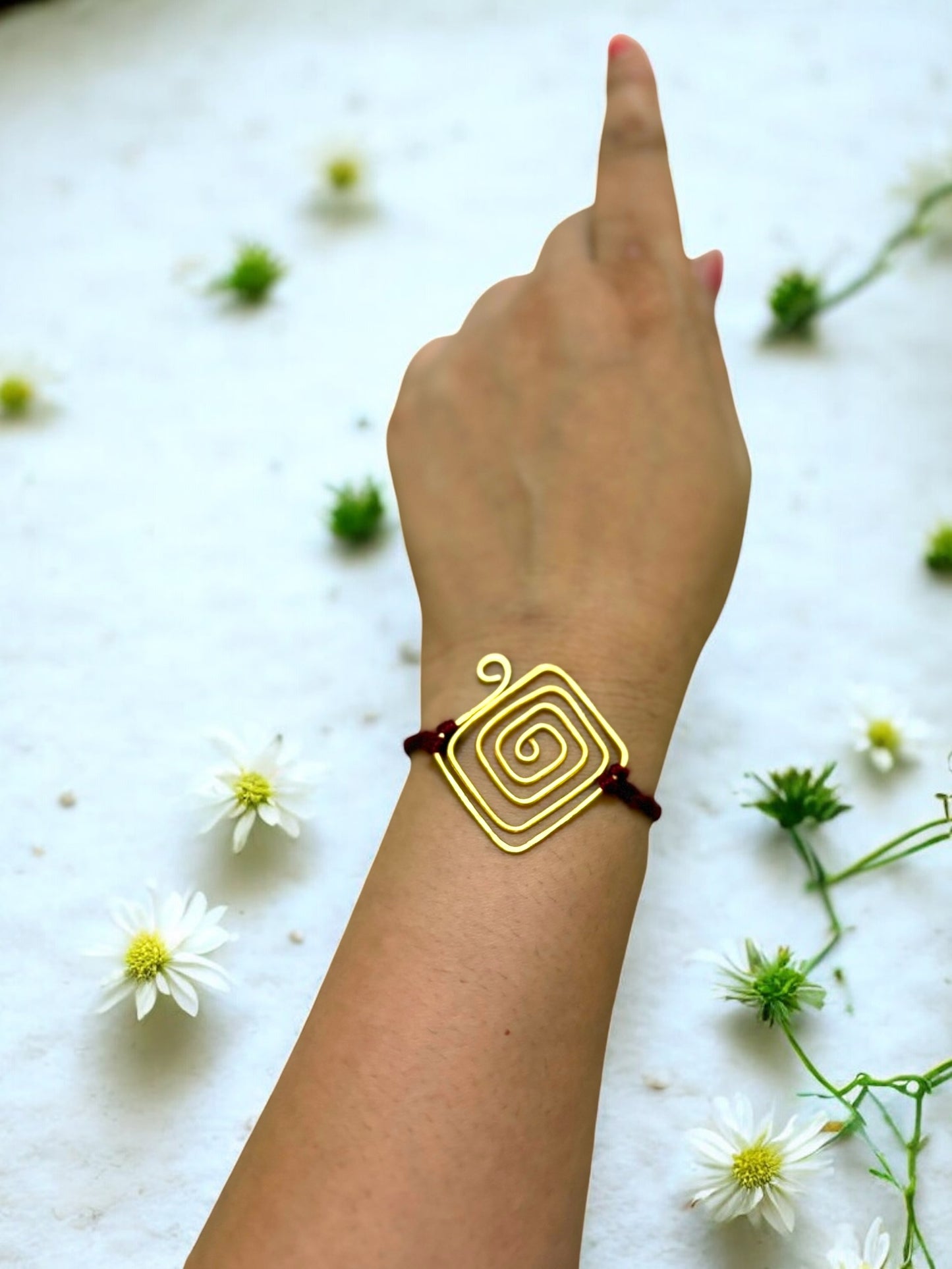 Spiral Kite Forever Brass Rakhi - Maroon
