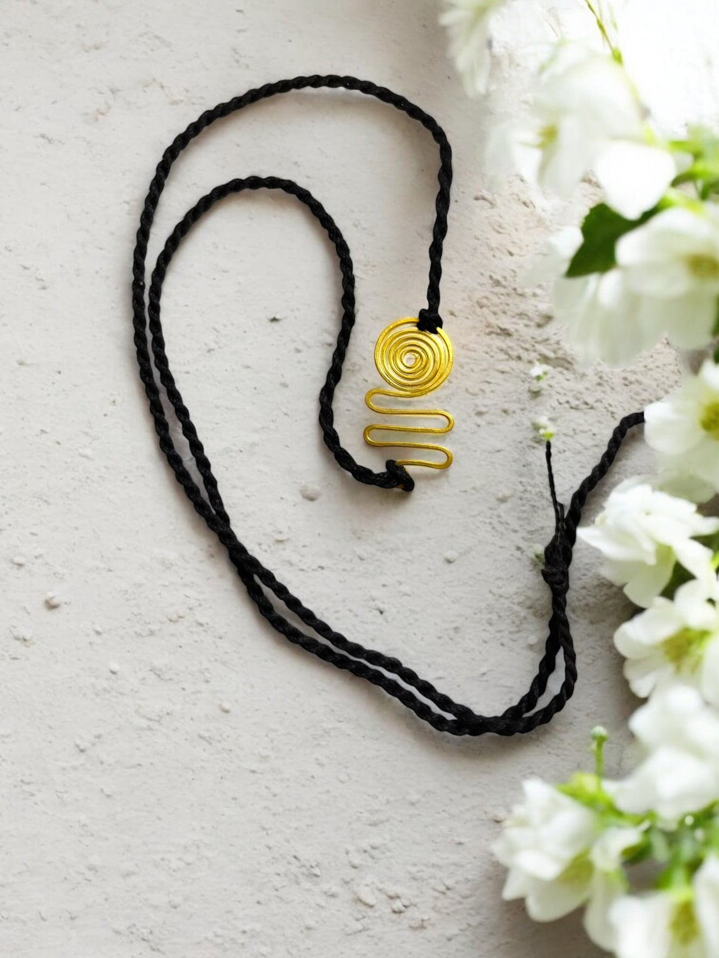 Spiral Wave Forever Brass Rakhi- Black