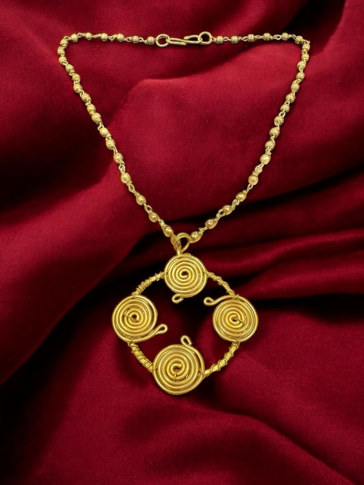 quadra-spiral-pendant-brass-necklace-jewelry-set-necklace-earrings-bangles