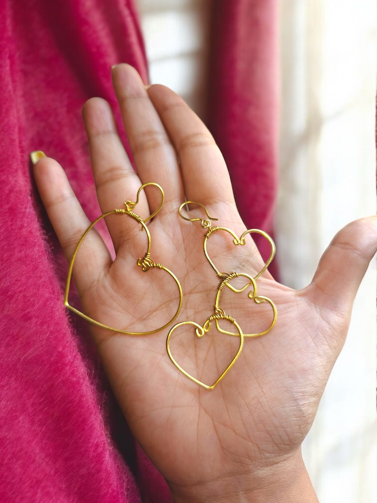 asymmentric-hearts-brass-earrings
