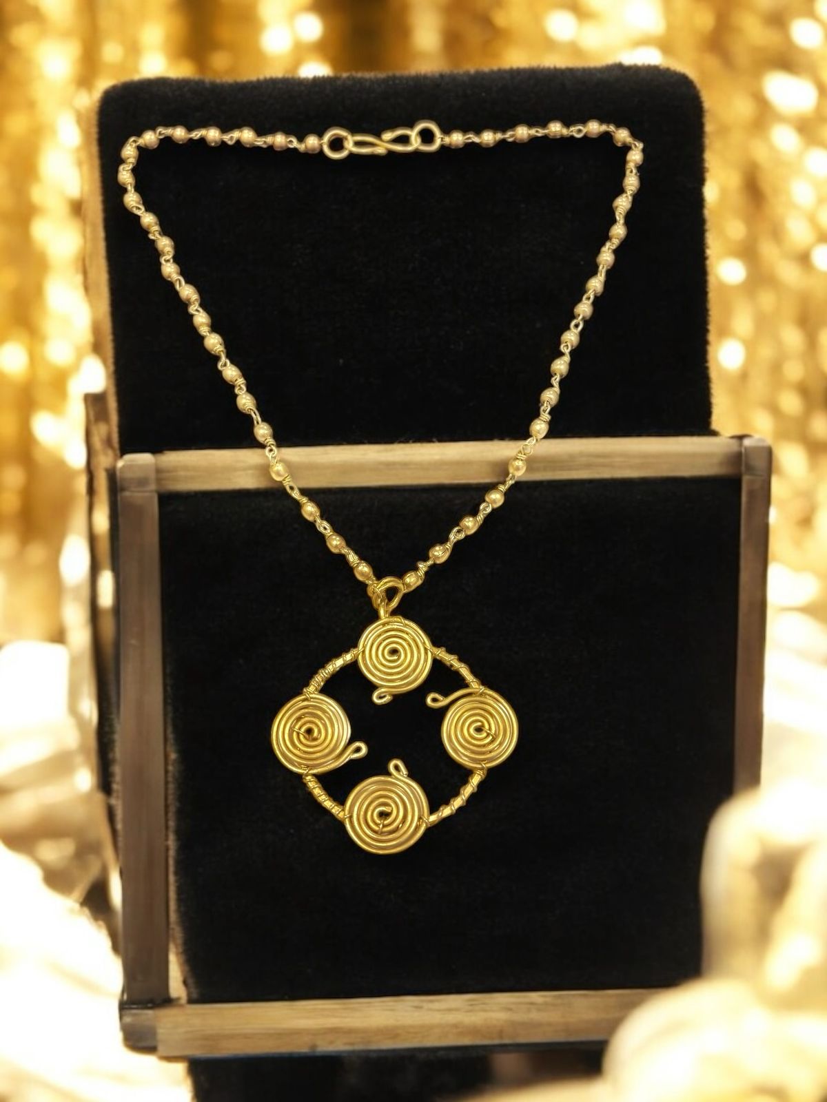 quadra-spiral-pendant-brass-necklace