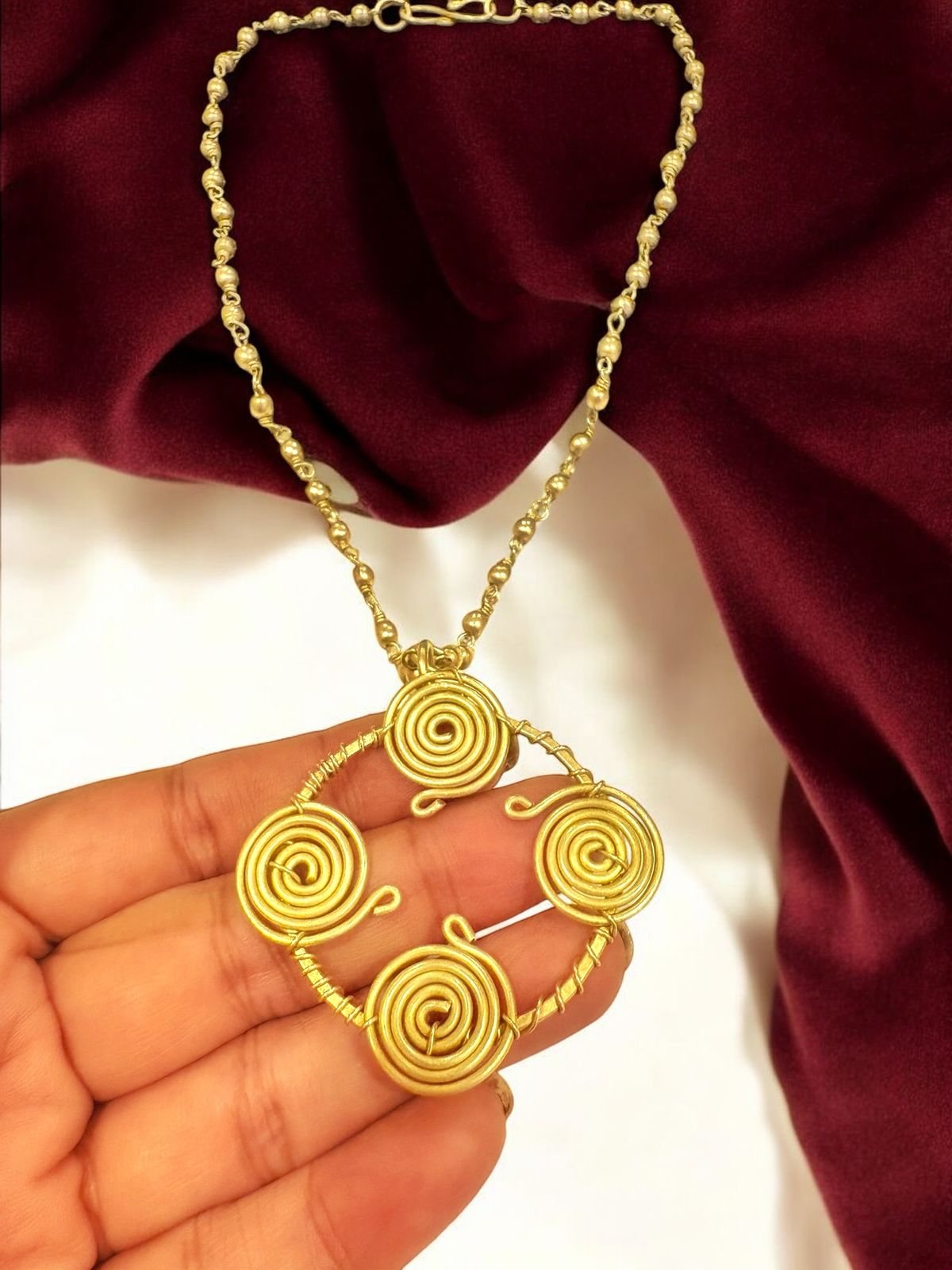 quadra-spiral-pendant-brass-necklace