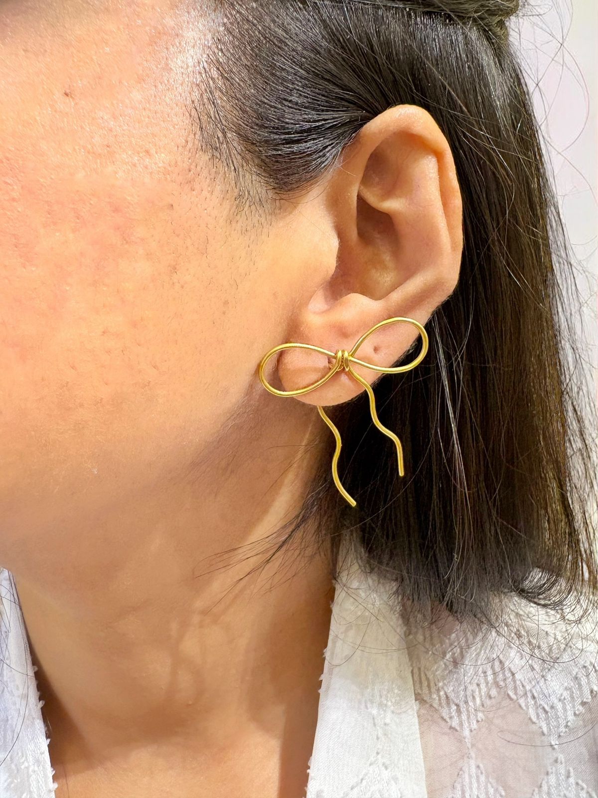 bow-brass-earrings