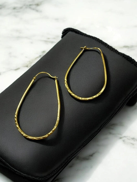 oval-hoops-brass-earrings