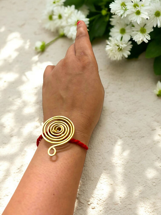 Round Spiral Forever Brass Rakhi - Red