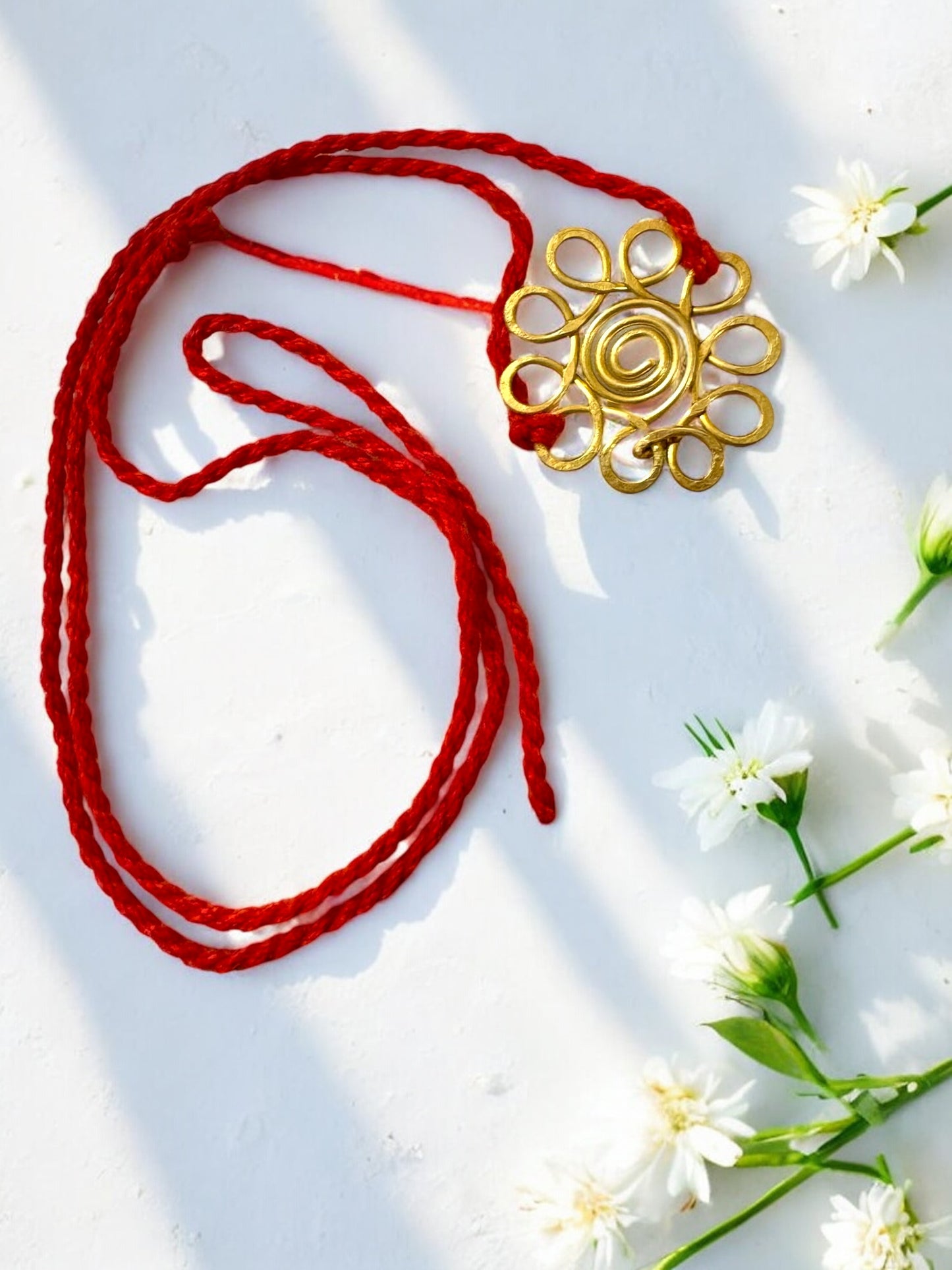 Spiral Flower Forever Brass Rakhi - Red