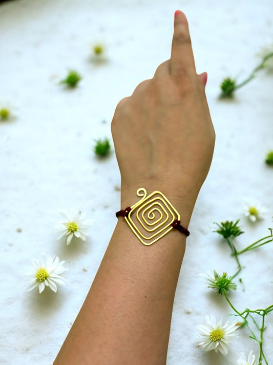 Spiral Kite Forever Brass Rakhi - Maroon
