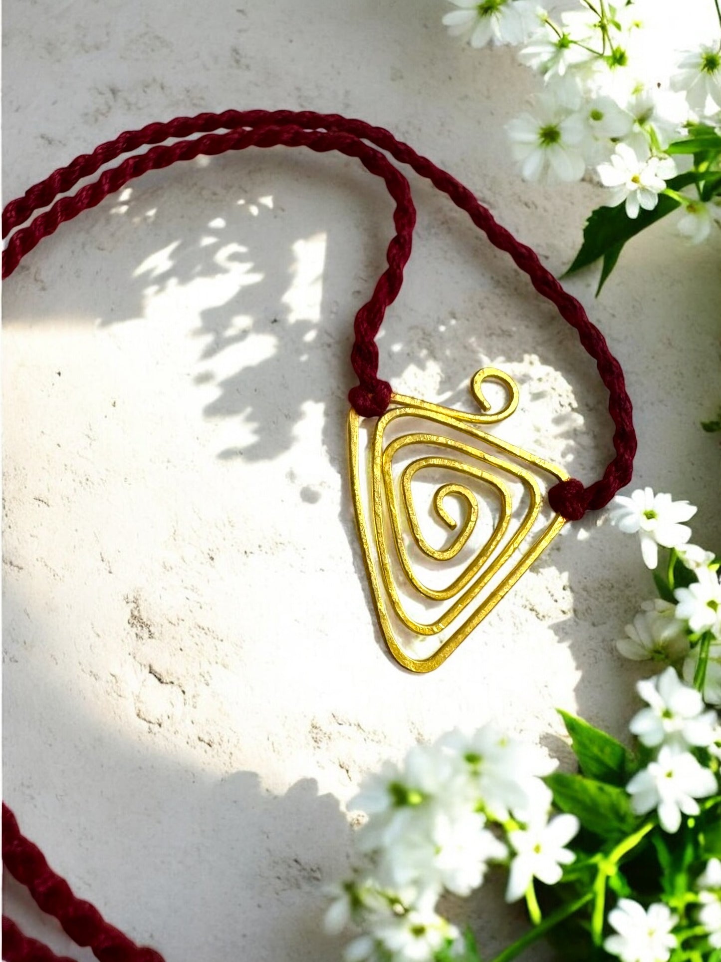 Triangle Spiral Forever Brass Rakhi - Maroon