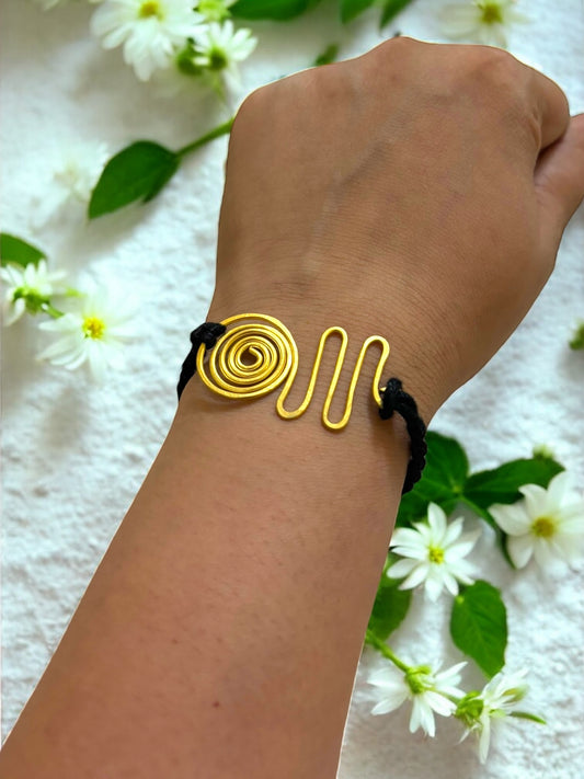 Spiral Wave Forever Brass Rakhi- Black
